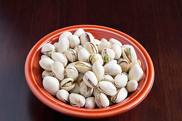 Image showing A bowl of Pistacios Nuts with Shell