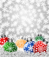 Image showing Colorful Snowflake Ornaments on Snow