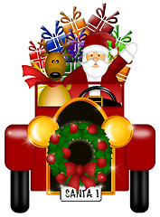 Image showing Santa and Reindeer Riding in Vintage Car Isolated