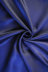 Image showing Smooth elegant dark blue silk as background 