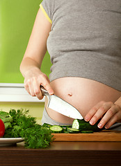 Image showing pregnant woman on kitchen