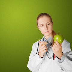 Image showing scientist woman with apple