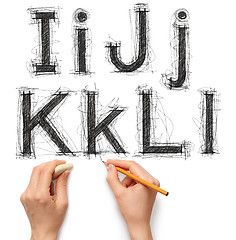 Image showing sketch letters and numbers with hand and pencil