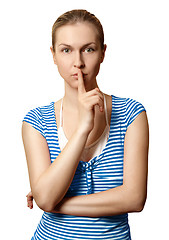 Image showing Sporty woman with finger near mouth