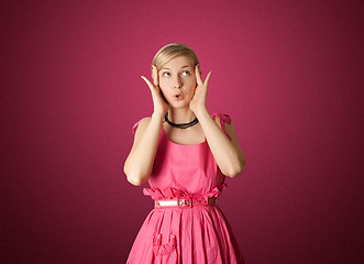 Image showing surprised girl in pink