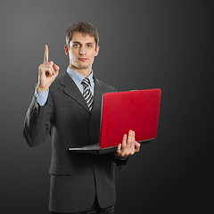 Image showing male in suit with laptop with idea