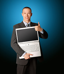 Image showing businessman with open laptop shows welldone