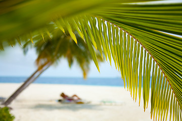 Image showing deck chair on the beach background