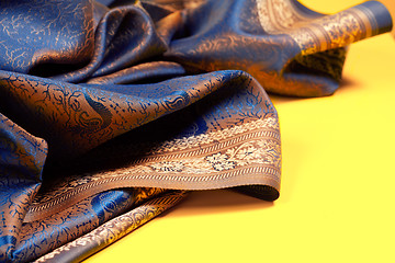 Image showing Beautiful fabric with golden lining