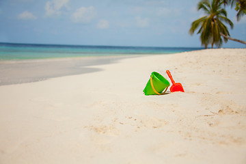 Image showing Toys in the sand