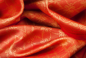 Image showing Folded fabric with ornament