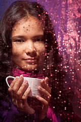 Image showing Cold rainy weather and cup of hot tea