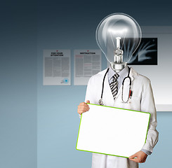 Image showing doctor with empty board and lamp-head