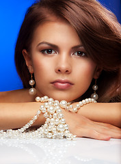 Image showing Young woman with pearls