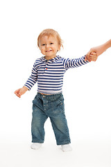 Image showing Cute kid pulling parent's hand