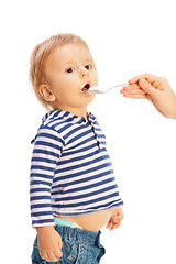 Image showing Toddler eating