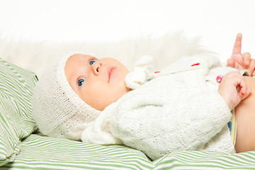 Image showing Little adorable baby in the bed