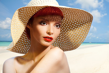 Image showing Beautiful woman in straw hat