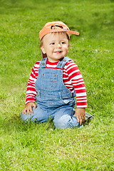 Image showing Smart kid sitting in the loan