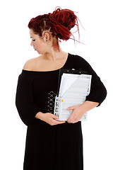 Image showing Young woman with folder of documents