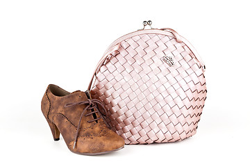 Image showing Pink bag with a shoe.