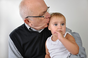 Image showing Senior man kissing daughter 