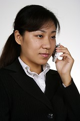 Image showing Asian girl on the phone