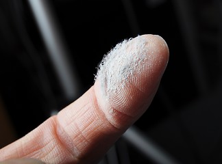 Image showing dust and finger