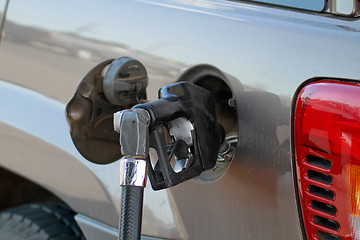 Image showing Pump Filling Up the Car Gas Tank 2