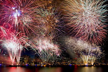 Image showing Fireworks Background with City Skyline