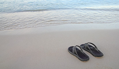 Image showing flip flops on the beach