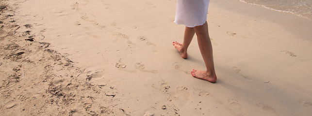 Image showing walking on the beach