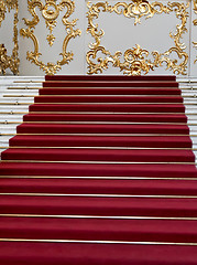 Image showing red carpet on the marble staircase