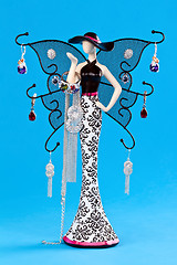 Image showing stand for jewelry, statuette, with wings