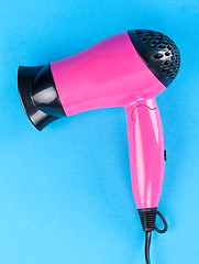 Image showing Pink hair dryer