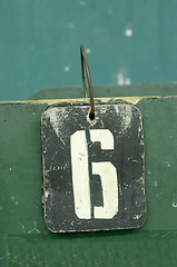 Image showing number tag, six