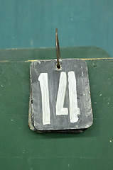 Image showing number tag, fourteen