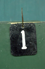 Image showing number tag, one