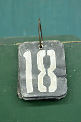 Image showing number tag, eighteen