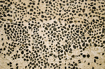 Image showing Wall decorated with small flint stones backdrop
