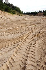 Image showing Freight car wheel marks left in the sand pit