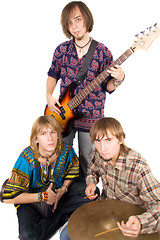 Image showing Musical band: the guitarist and two drummers