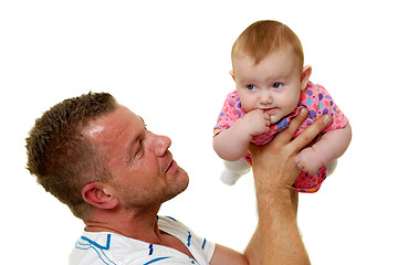 Image showing Father and baby are playing
