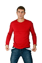 Image showing man shows two empty pockets