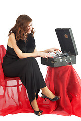 Image showing Pretty woman listen music