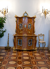 Image showing Old vintage dresser, chair and candle holders