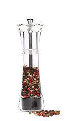 Image showing peppermill with peppercorns on white background 