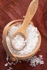 Image showing salt crystals in wooden bowl with spoon