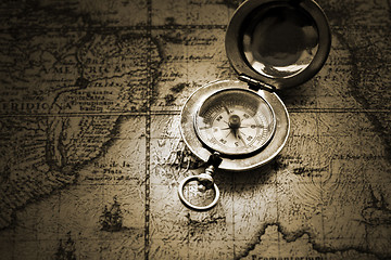 Image showing old compass on vintage map 