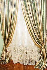 Image showing window with striped curtians and  tulle